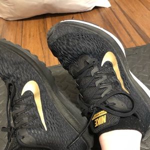 Black and gold Nike Zoom Winflo 5